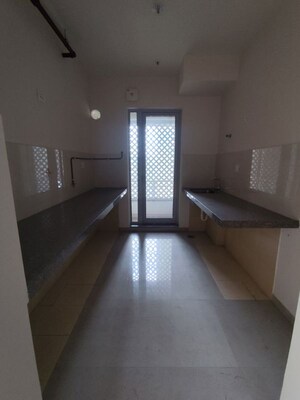 Kitchen in 2 BHK Apartment at Piramal Vaikunth, Balkum Pada – for Rent