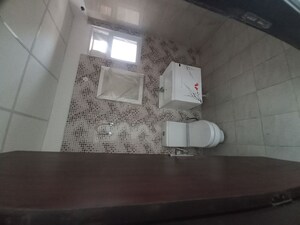 Bathroom in 3.5 BHK Apartment at Elite Golf Green, Sector 79 – for Sale