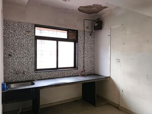 Kitchen in 1 BHK Apartment at Satyam Eleganza, Ambernath – for Sale
