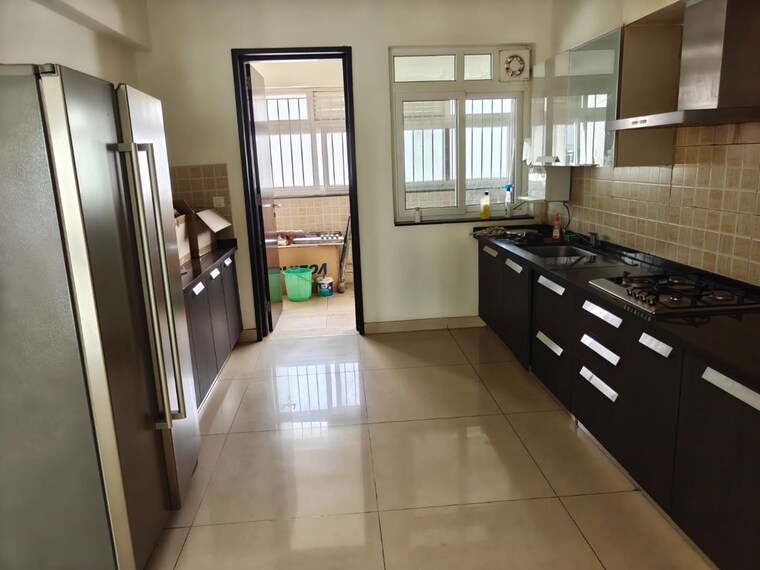 Kitchen, brigade-caladium 4 Bedroom 4200 Sq.Ft. Apartment In Hebbal Bangalore 10581307