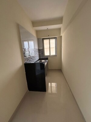 Kitchen in 1 BHK Apartment at Seven Eleven Apna Ghar Phase III, Mira Road – for Sale