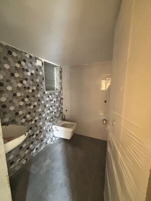 Bathroom in 1 BHK Apartment at Seven Eleven Apna Ghar Phase III, Mira Road – for Sale