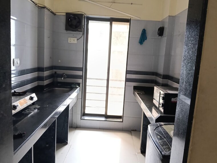 Kitchen, seven-eleven-regency 1 Bedroom 421 Sq.Ft. Apartment In Mira Road Thane 10581335