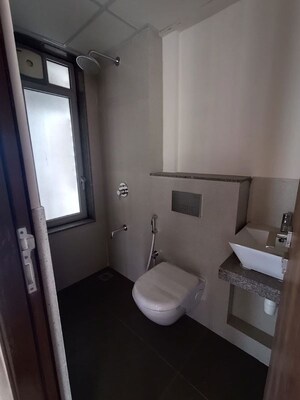 Bathroom in 2 BHK Apartment at Piramal Vaikunth, Balkum Pada – for Rent