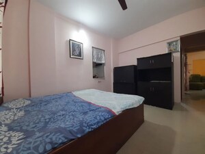 Bedroom in 2 BHK Apartment at Satellite Garden, Goregaon East – for Rent