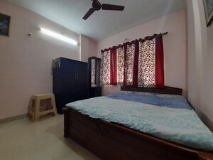 Bedroom in 2 BHK Apartment at Satellite Garden, Goregaon East – for Rent