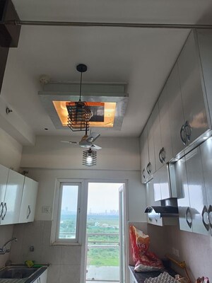 Kitchen in 2 BHK Apartment at Samridhi Luxuriya Avenue, Sector 150 – for Rent