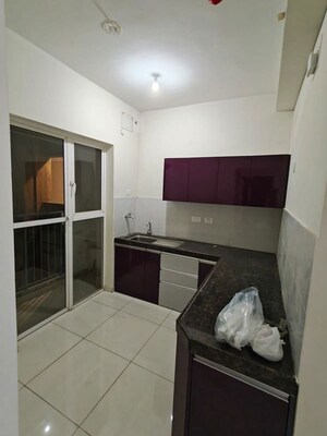 Kitchen in 2 BHK Apartment at Kolte Patil Ivy Estate Nia, Wagholi – for Rent