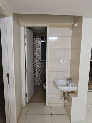 Bathroom in 2 BHK Apartment at Kolte Patil Ivy Estate Nia, Wagholi – for Rent