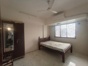 Bedroom in 2 BHK Apartment at Sai Proviso Apartment, Kopar Khairane – for Rent