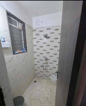 Bathroom in 1 BHK Apartment at Balaji Mesmero, Lohgaon – for Rent