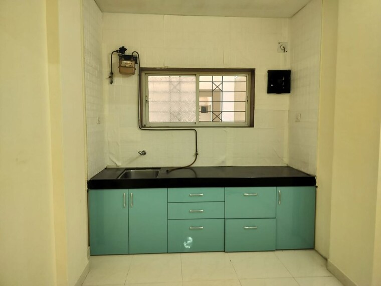 Kitchen, anmol-residency 2 Bedroom 800 Sq.Ft. Apartment In Wakad Pune 10581476