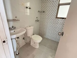Bathroom in 3 BHK Apartment at Sanchar Residency, Raj Nagar Extension – for Sale