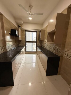 Kitchen in 2 BHK Apartment at Raj Infinia, Malad West – for Sale