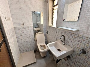 Bathroom in 1 BHK Apartment at Vasant Mandar CHS, Vasant Vihar – for Rent