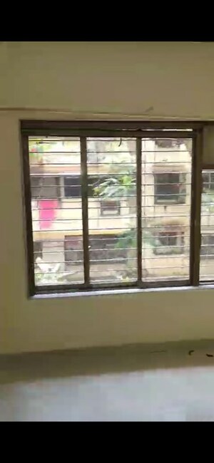 Room in 1 BHK Apartment at Silver Sands CHS, Goregaon West – for Rent