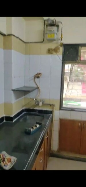 Kitchen in 1 BHK Apartment at Silver Sands CHS, Goregaon West – for Rent