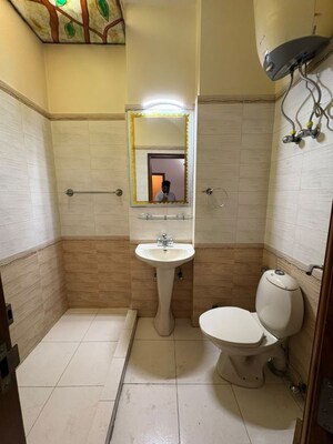 Bathroom in 2 BHK Apartment at Green Park – for Rent