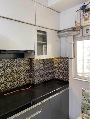 Kitchen in 1 BHK Apartment at Lodha Crown Kolshet, Kolshet Road – for Sale