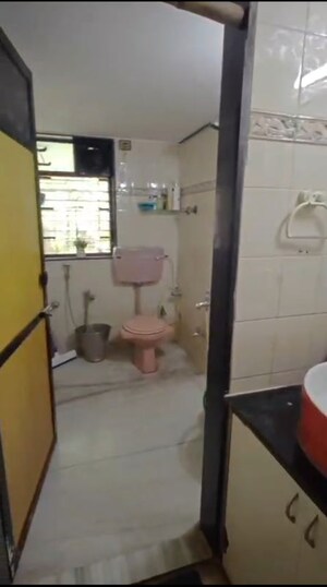 Bathroom in 2 BHK Apartment at Tirath Apartment, Vile Parle West – for Rent