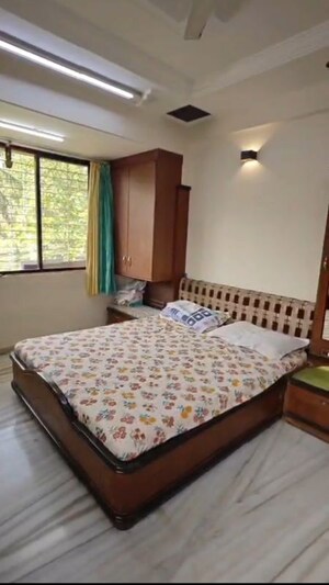 Bedroom in 2 BHK Apartment at Tirath Apartment, Vile Parle West – for Rent