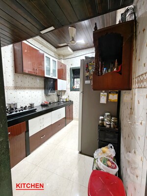 Kitchen in 2 BHK Apartment at Kopar Khairane Sector 2 – for Sale
