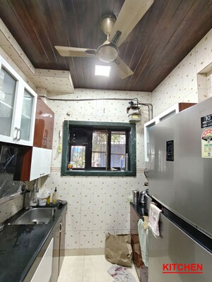 Kitchen in 2 BHK Apartment at Kopar Khairane Sector 2 – for Sale