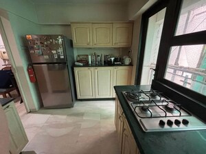 Kitchen in 2 BHK Apartment at Saptrishi Juhu Serene, Dn Nagar – for Rent
