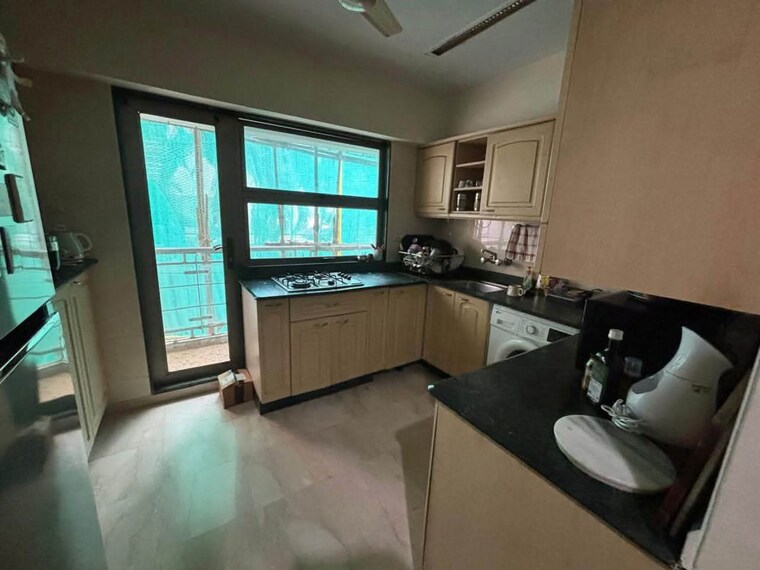Kitchen, saptrishi-juhu-serene 2 Bedroom 1200 Sq.Ft. Apartment In Dn Nagar Mumbai 10581774