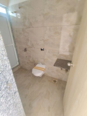 Bathroom in 2 BHK Apartment at Unnati Woods CHS, Kasarvadavali – for Sale