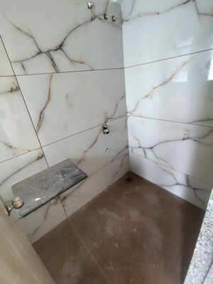 Bathroom in 2 BHK Apartment at Unnati Woods CHS, Kasarvadavali – for Sale