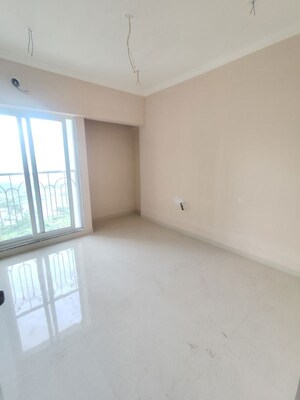 Room in 2 BHK Apartment at Unnati Woods CHS, Kasarvadavali – for Sale
