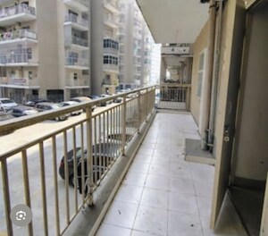 Balcony in 2 BHK Apartment at Adore Happy Homes Grand, Sector 85 – for Rent