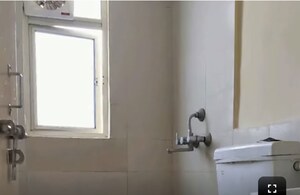 Bathroom in 3 BHK Apartment at Conscient Habitat 78, Sector 78 – for Rent