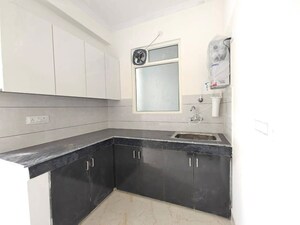 Kitchen in 1 BHK Apartment at Freedom Fighters Enclave – for Rent