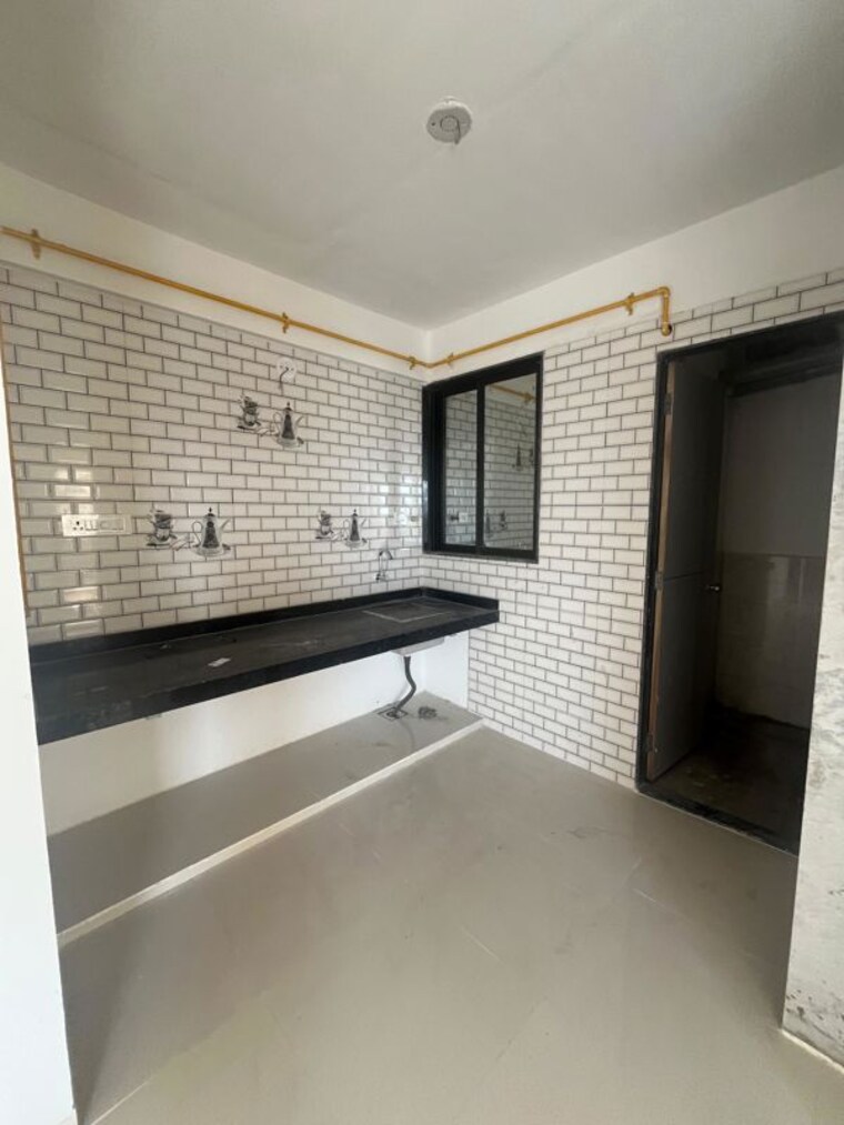 Kitchen, surat dumas road 1 Bedroom 813 Sq.Ft. Apartment In Surat Dumas Road Surat 10559013