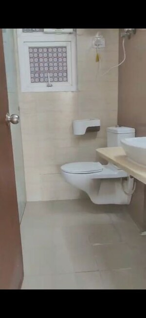 Bathroom in 3 BHK Apartment at Mahagun Moderne, Sector 78 – for Rent
