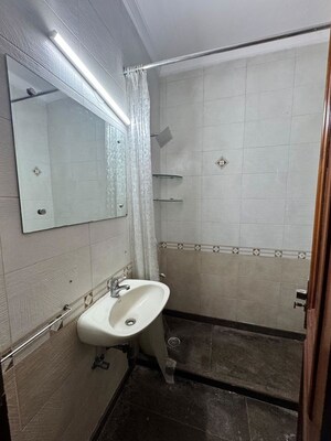 Bathroom in 3 BHK Builder Floor at Greater Kailash I – for Rent