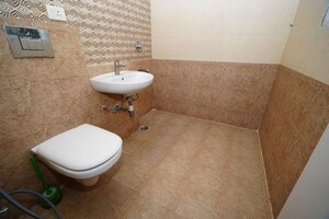 Bathroom in 2 BHK Apartment at Sam Palm Olympia, Sector 16c Greater Noida – for Sale