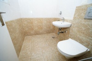 Bathroom in 2 BHK Apartment at Sam Palm Olympia, Sector 16c Greater Noida – for Sale