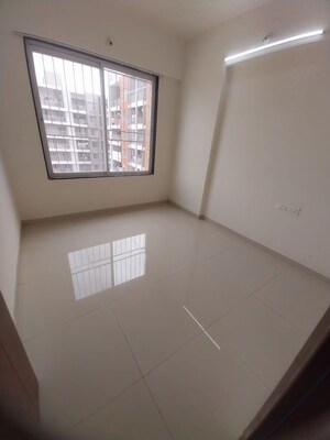 Room in 2 BHK Apartment at Tulip Infinity Planet, Moshi – for Rent