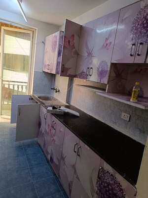 Kitchen in 2 BHK Apartment at Sikka Karmic Greens, Sector 78 – for Rent