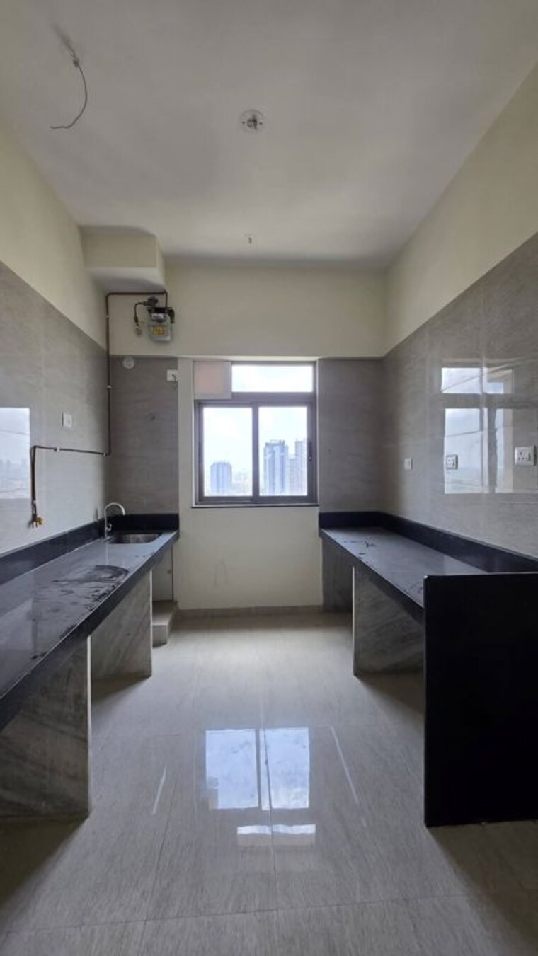 Kitchen, sheth-auris-serenity-tower-3 2 Bedroom 805 Sq.Ft. Apartment In Malad West Mumbai 10582541