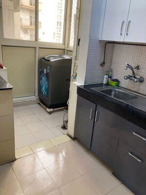 Kitchen in 3 BHK Apartment at Gaur Sportswood, Sector 79 – for Rent