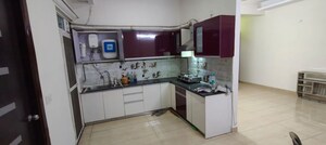 Kitchen in 3.5 BHK Apartment at Mahagun Moderne, Sector 78 – for Rent
