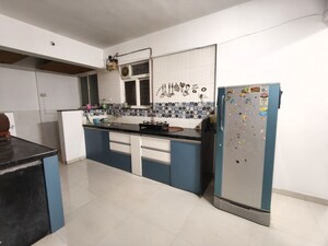 Kitchen in 2 BHK Apartment at Dhanashree Aashiyana, Undri – for Rent