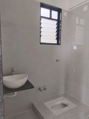 Bathroom in 2 BHK Apartment at Woodsville Phase III, Moshi – for Rent