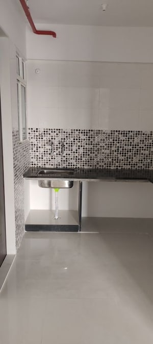 Kitchen in 2 BHK Apartment at Noble Vishnu Vihar, Moshi – for Rent