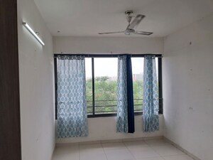 Room in 2.5 BHK Apartment at Ganesh Malabar Retreat, Near Nirma University On Sg Highway – for Rent