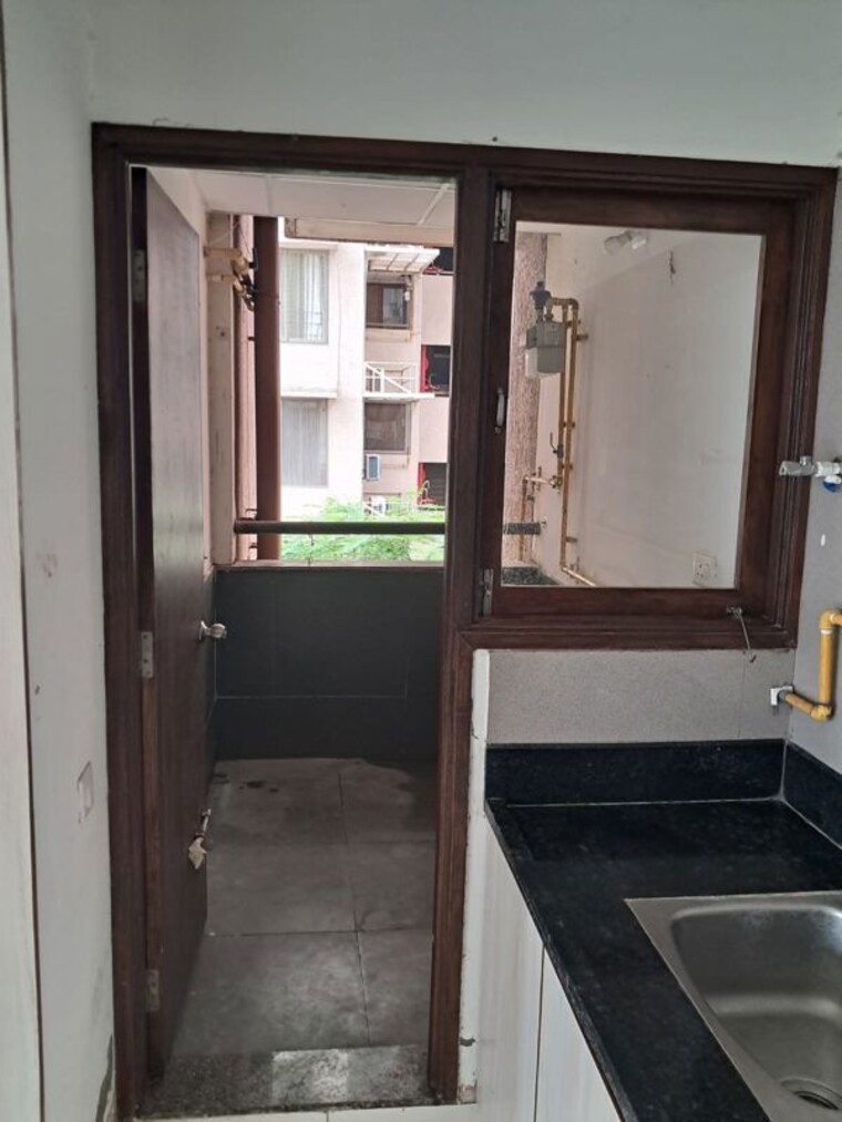 Kitchen, ganesh-malabar-retreat 2.5 Bedroom 845 Sq.Ft. Apartment In Near Nirma University On Sg Highway Ahmedabad 10582622